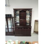 A modern mahogany effect wall unit