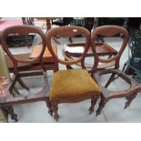 Three Victorian mahogany balloon back dining chairs