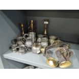 A selection of pewter and brass ware including sommelier's stand