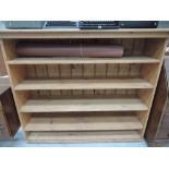 A stripped pine bookshelf