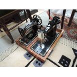 Two vintage sewing machines, Singer and PFAFF