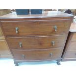 An early 20th Century mahogany bow fronted chest of drawers