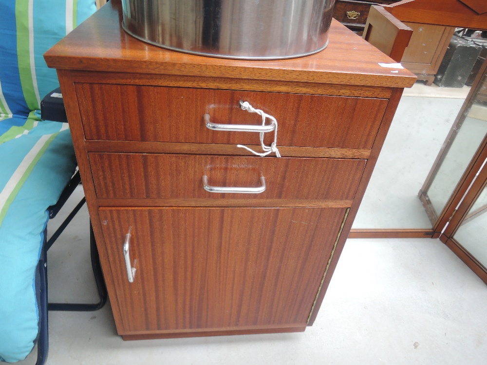 A vintage teak or sapele office cabinet