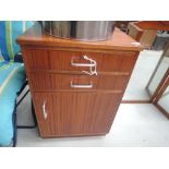 A vintage teak or sapele office cabinet