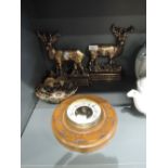 An Aneroid barometer, Indian style brass dish and pair of brass door stops modelled as stags