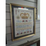 An embroidered silver jubilee souvenir framed