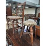 A 19th Century rush seated spindle back chair and a similar period stool