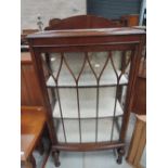 An early to mid 20th Century oak display cabinet of small proportions