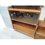 A modern teak effect TV cabinet