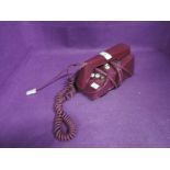 A 1970's Geomarc Trimline phone in Purple