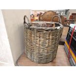 A selection of wicker basket including large log style
