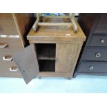 A mid 20th Century part walnut bedside cabinet