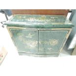 An Oriental side cabinet in green and gilt