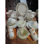 A selection of tea cups and saucers including Palissy and Stanley