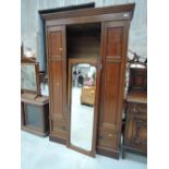 An Edwardian mahogany wardrobe