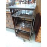 An early 20th Century oak revolving bookcase