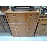 A vintage golden oak chest of 5 bedroom drawers, labelled Gomme (early G plan)