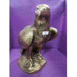 A life size gilt and plaster cast figure of and eagle or similar bird of pray