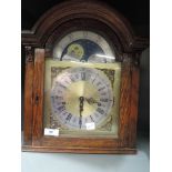 A long case clock top German made movement