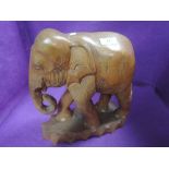 A hand carved ethnic wood African elephant