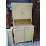 A vintage painted kitchenette