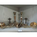 A selection of brass cast candle sticks and similar including sconce pair