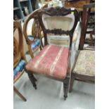 A Victorian rosewood dining chair having demi crest balloon back with later seat and fluted legs