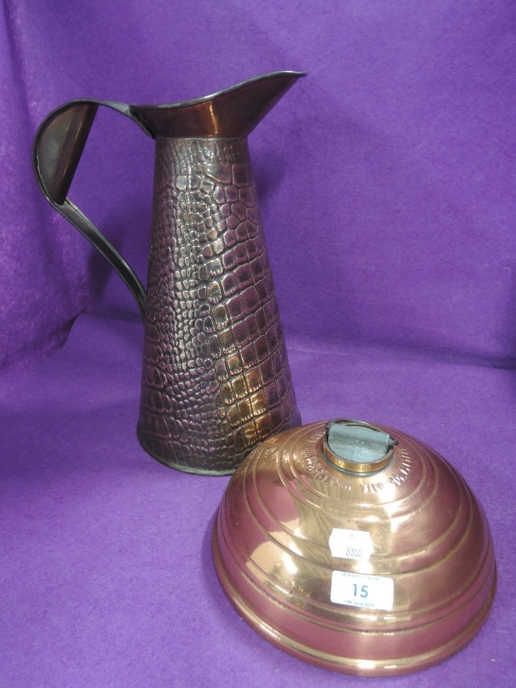 A copper water jug by Joseph Sankey and bed warmer
