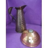 A copper water jug by Joseph Sankey and bed warmer