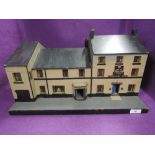 A replica model of local tavern The Morecambe Hotel with Tetleys advertisment integrated