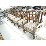A set of six (4 plus 2) ladder back dining chairs