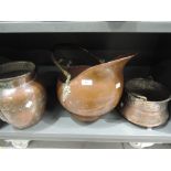 A selection of copper wares including coal helmet bucket