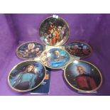 A selection of sci fi themed display plates Star wars and Startrek
