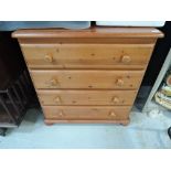 A modern pine 4 drawer bedroom chest