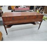 An early 19th century mahogany square piano converted to sideboard having line inlay decoration with