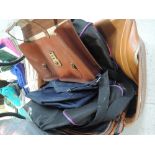 A selection of leather bags including suitcase