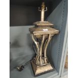 A heavy metal set and cast lamp base with Bohemian design