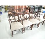 A set of EIGHT ( 6 plus 2) reproduction dining chairs with fleur de lys shield back