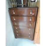 A mid 20th Century oak bedroom chest