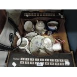 A selection of tea cups and saucers and tea pots