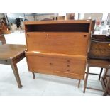 A vintage teak sideboard/bureau/cocktail cabinet