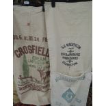 A selection of advertising sacks including Barrow and Ulverston interest