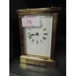 A late 20th century brass carriage clock of traditional design presented 1979