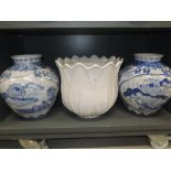 A pair or dutch delft style vase and large lotus flower design planter