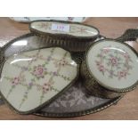 A dressing table set with lace work tray