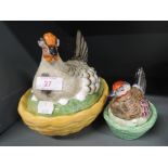 Two hand painted ceramic egg nests in the form of Hen on nest