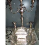 A Sheffield plate two loop arm convertible candelabrum of elongated octagon form with tapered