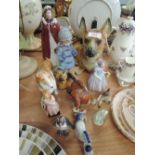 A selection of figures and figurines including Royal Doulton