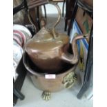 A selection of copper wares including copper stove kettle and planter