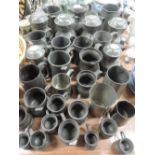 A good selection of pewter tankards some bearing touch marks